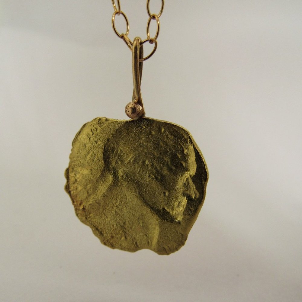 Gold necklace. "Washington Quarter" necklace.